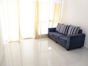 Living Room in 2 BHK Apartment at Kohinoor Tinsel County, Hinjewadi – for Rent