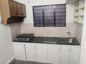 Kitchen in 1 BHK Apartment at Wadgaon Sheri – for Rent