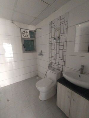 Bathroom in 2 BHK Apartment at Gulshan Bellina, Sector 16 Greater Noida – for Rent