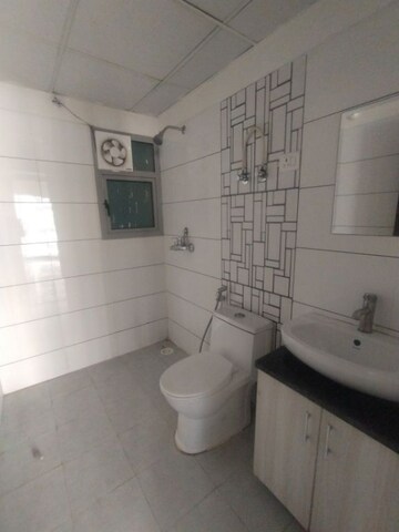 Bathroom in 2 BHK Apartment at Gulshan Bellina, Sector 16 Greater Noida – for Rent