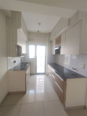 Kitchen in 2 BHK Apartment at Gulshan Bellina, Sector 16 Greater Noida – for Rent
