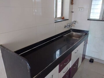 Kitchen in 2 BHK Apartment at Ganeesham Phase II, Pimple Saudagar – for Rent