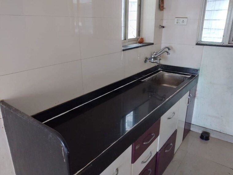 Kitchen, ganeesham-phase-ii 2 Bedroom 950 Sq.Ft. Apartment In Pimple Saudagar Pune 10051228