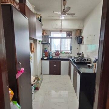 Kitchen in 3 BHK Apartment at Lokhandwala Harmony, Worli Naka – for Sale