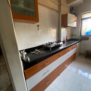 Kitchen in 2 BHK Apartment at Royal Classic Co Op Society, Shashtri Nagar – for Rent