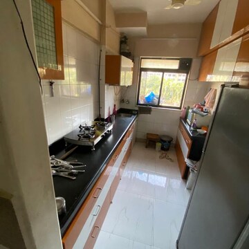 Kitchen in 2 BHK Apartment at Royal Classic Co Op Society, Shashtri Nagar – for Rent