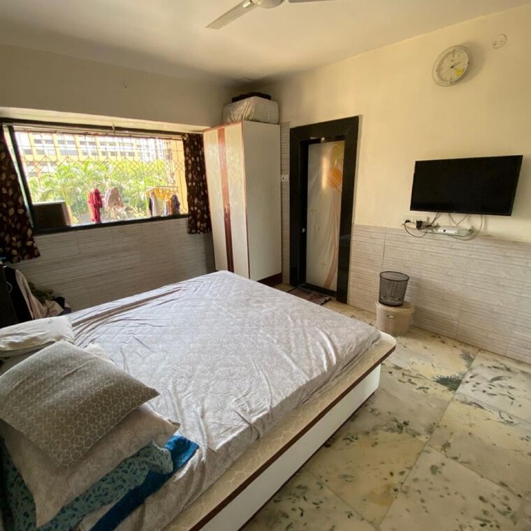 Bedroom, royal-classic-co-op-society 2 Bedroom 950 Sq.Ft. Apartment In Shashtri Nagar Mumbai 10051335