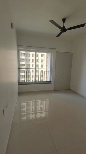 Room in 2 BHK Apartment at Rustomjee Urbania Azziano, Thane West – for Rent