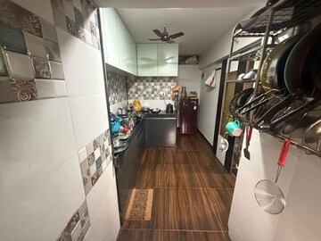 Kitchen in 1.5 BHK Apartment at Saket Complex, Kalwa – for Sale
