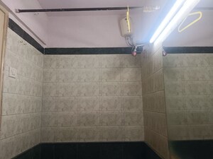 Bathroom in 2 BHK Apartment at Ashoka Madhuban CHS, Malad East – for Rent