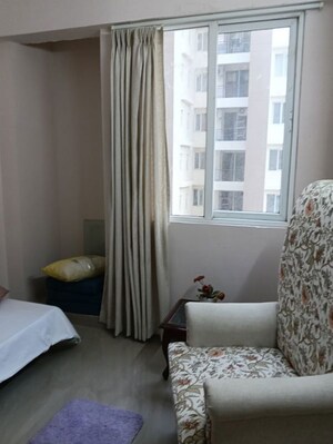 Living Room in 2 BHK Apartment at Amrapali Terrace Homes, Tech Zone 4 Greater Noida – for Rent
