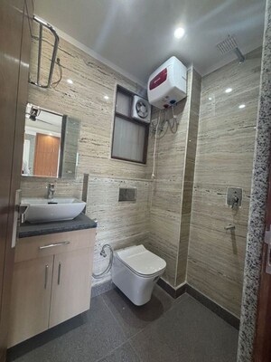 Bathroom in 3 BHK Apartment at Freedom Fighters Enclave – for Rent