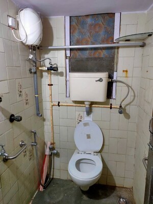 Bathroom in 2 BHK Apartment at Sachin CHS, Andheri West – for Rent