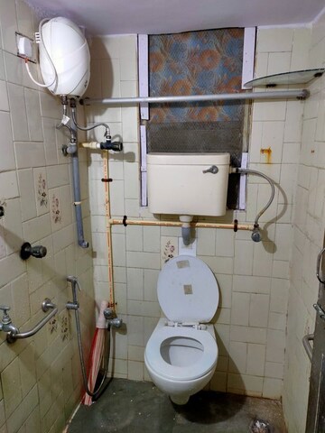 Bathroom in 2 BHK Apartment at Sachin CHS, Andheri West – for Rent