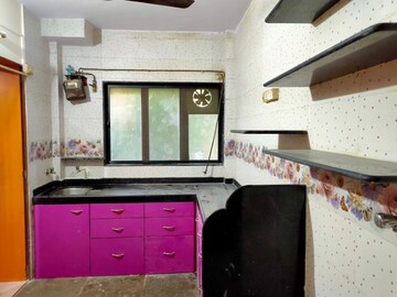 Kitchen in 2 BHK Apartment at Sachin CHS, Andheri West – for Rent