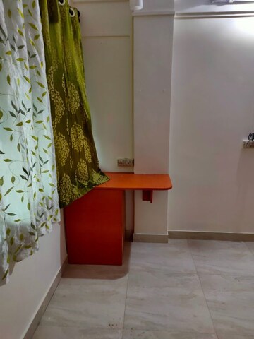 Living Room in 2 BHK Apartment at Sachin CHS, Andheri West – for Rent