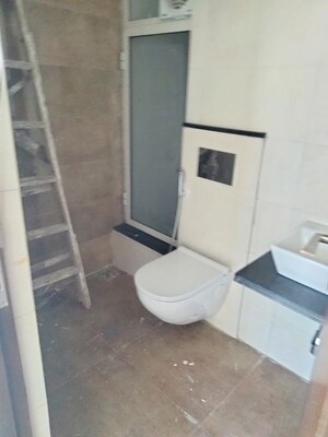 Bathroom in 2 BHK Apartment at Omkar Signet, Malad East – for Rent