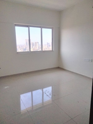 Room in 2 BHK Apartment at Omkar Signet, Malad East – for Sale