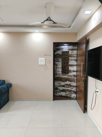 Living Room in 2 BHK Apartment at Juhi Lawns, Seawoods – for Rent