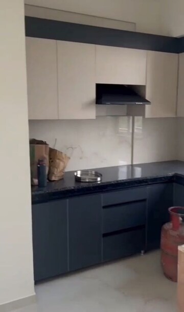 Kitchen in 2 BHK Apartment at Smart World Gems, Sector 89 – for Rent