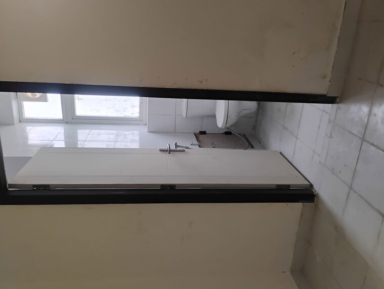 Kitchen, sushant golf city 3.5 Bedroom 2450 Sq.Ft. Apartment In Sushant Golf City Lucknow 10052517