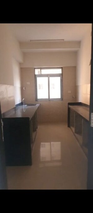 Kitchen in 2 BHK Apartment at Naman Regency, Byculla – for Sale