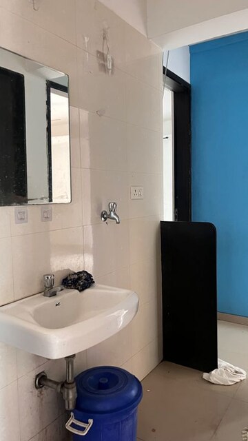 Bathroom in 3 BHK Apartment at Topaz CHS Shivajinagar, Shivajinagar – for Rent