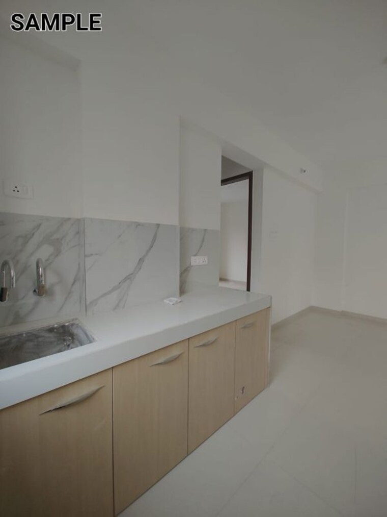 Kitchen, wadgaon sheri 2 Bedroom 950 Sq.Ft. Apartment In Wadgaon Sheri Pune 10052731