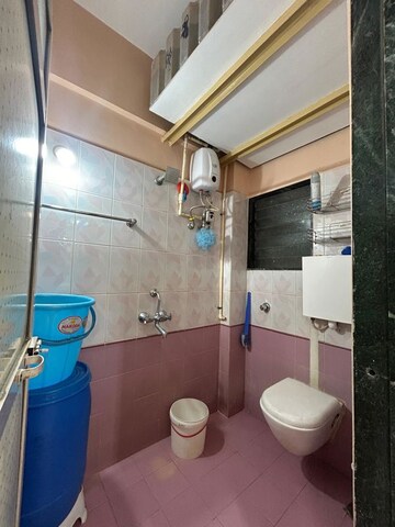 Bathroom in 1 BHK Apartment at Yashraj Park CHS, Kasarvadavali – for Sale