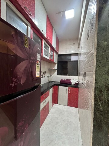 Kitchen in 1 BHK Apartment at Yashraj Park CHS, Kasarvadavali – for Sale