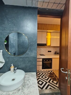 Bathroom in Studio Apartment at Galaxy Blue Sapphire Plaza, Sector 4 Greater Noida – for Sale