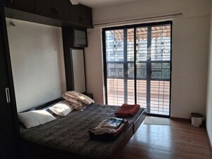Bedroom in 2 BHK Apartment at Aarti Heights, Mohammadwadi – for Rent