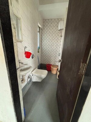 Bathroom in 1 BHK Apartment at Devtaa Codename Desire, Nahur West – for Sale