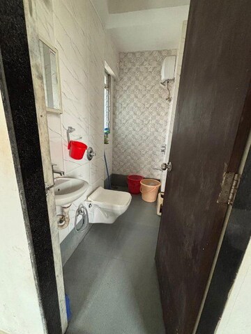 Bathroom in 1 BHK Apartment at Devtaa Codename Desire, Nahur West – for Sale