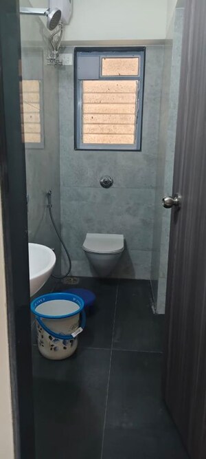Bathroom in 2 BHK Apartment at Hava Hira CHS, Malad West – for Sale