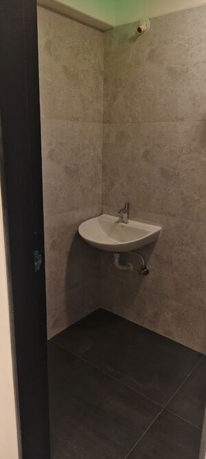 Bathroom in 2 BHK Apartment at Hava Hira CHS, Malad West – for Sale