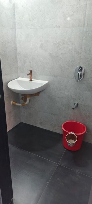 Bathroom in 2 BHK Apartment at Hava Hira CHS, Malad West – for Sale