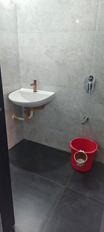 Bathroom in 2 BHK Apartment at Hava Hira CHS, Malad West – for Sale