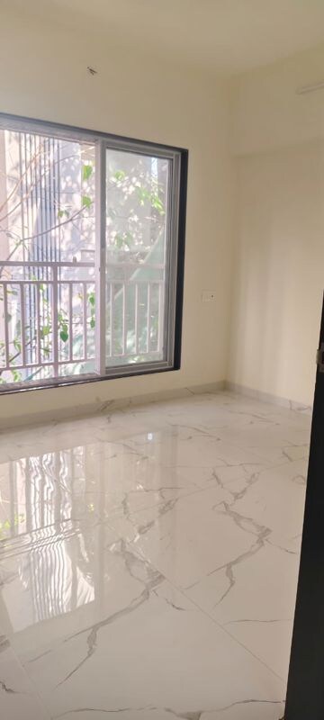 Room in 2 BHK Apartment at Hava Hira CHS, Malad West – for Sale
