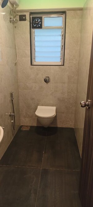 Bathroom in 1 BHK Apartment at Hava Hira CHS, Malad West – for Sale