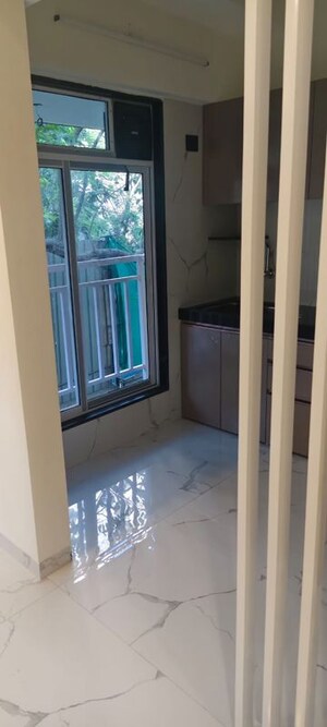Room in 1 BHK Apartment at Hava Hira CHS, Malad West – for Sale