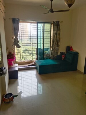 Living Room in 2 BHK Apartment at Shree Satya Shankar Residency, Manpada – for Rent
