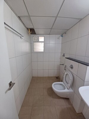 Bathroom in 2.5 BHK Apartment at Godrej Aqua, International Airport Road – for Rent