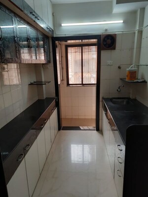 Kitchen in 1 BHK Apartment at Atul Blue Empire, Kandivali West – for Sale