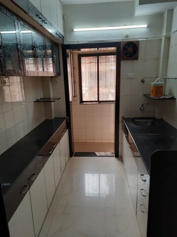 Kitchen in 1 BHK Apartment at Atul Blue Empire, Kandivali West – for Sale