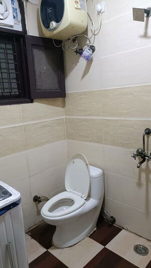 Bathroom in 3 BHK Builder Floor at Vasundhara Sector 1 – for Sale