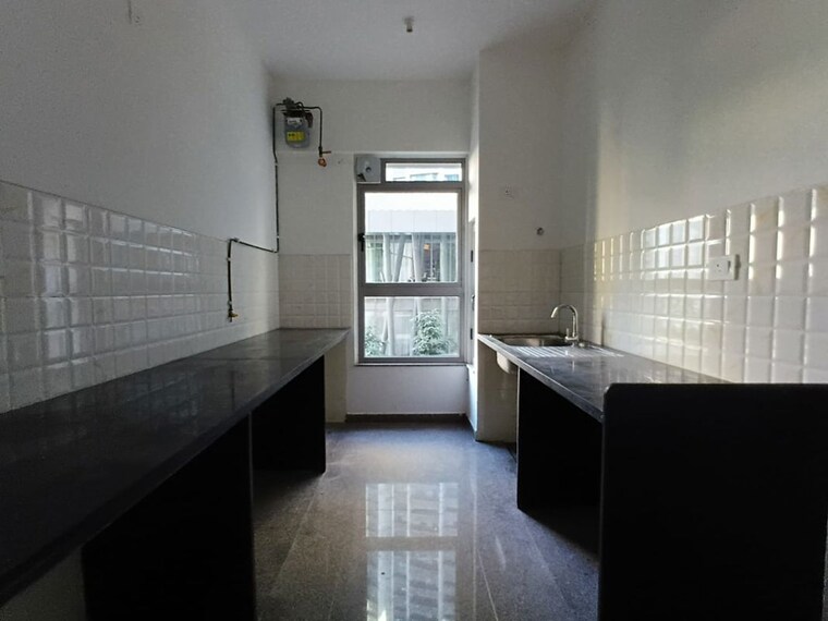 Kitchen, kalpataru-immensa 2 Bedroom 808 Sq.Ft. Apartment In Kolshet Road Thane 10053448