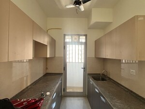 Kitchen in 2 BHK Apartment at Piramal Revanta, Moti Nagar – for Rent