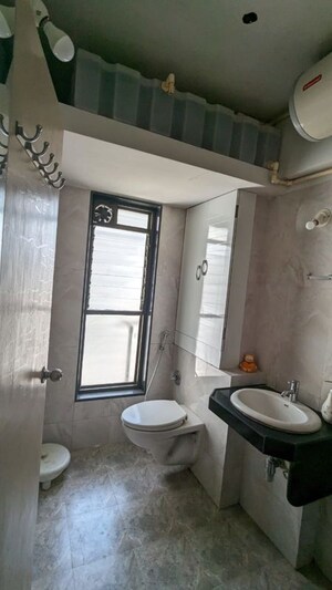 Bathroom in 3 BHK Apartment at DLH Sorrento, Veera Desai Road – for Rent