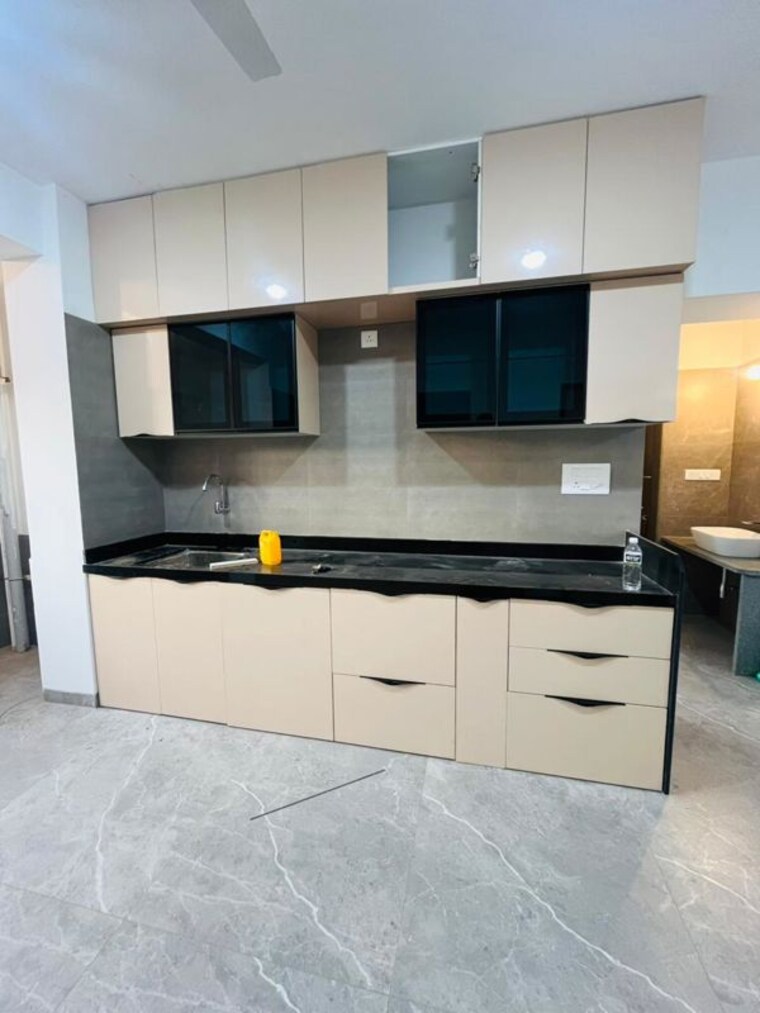 Kitchen, astha-baner 2 Bedroom 1000 Sq.Ft. Apartment In Baner Pune 10053719